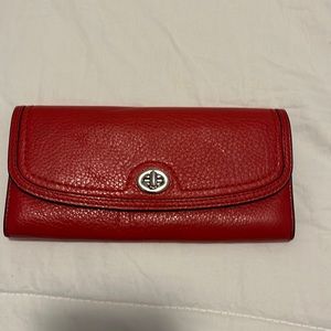 Red orange leather wallet. Coach